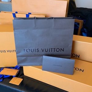 Louis Vuitton shopping bag.